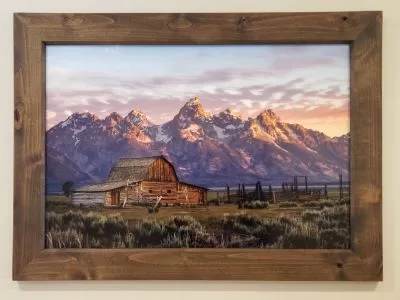 Framed metal nature wall art example of Grand Tetons with Barn